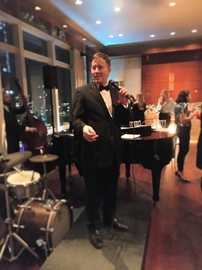 A-Affordable Decks owner Frank Lamphere singing for the Miami Dolphins owner in New York City 