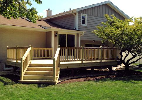 Wood deck in Darien IL - DuPageDecks.com  "We love it!  We are all excited to use it this coming weekend.  Thank you so much; the design fits our house/setup perfectly, and you can see the quality craftsmanship right away"